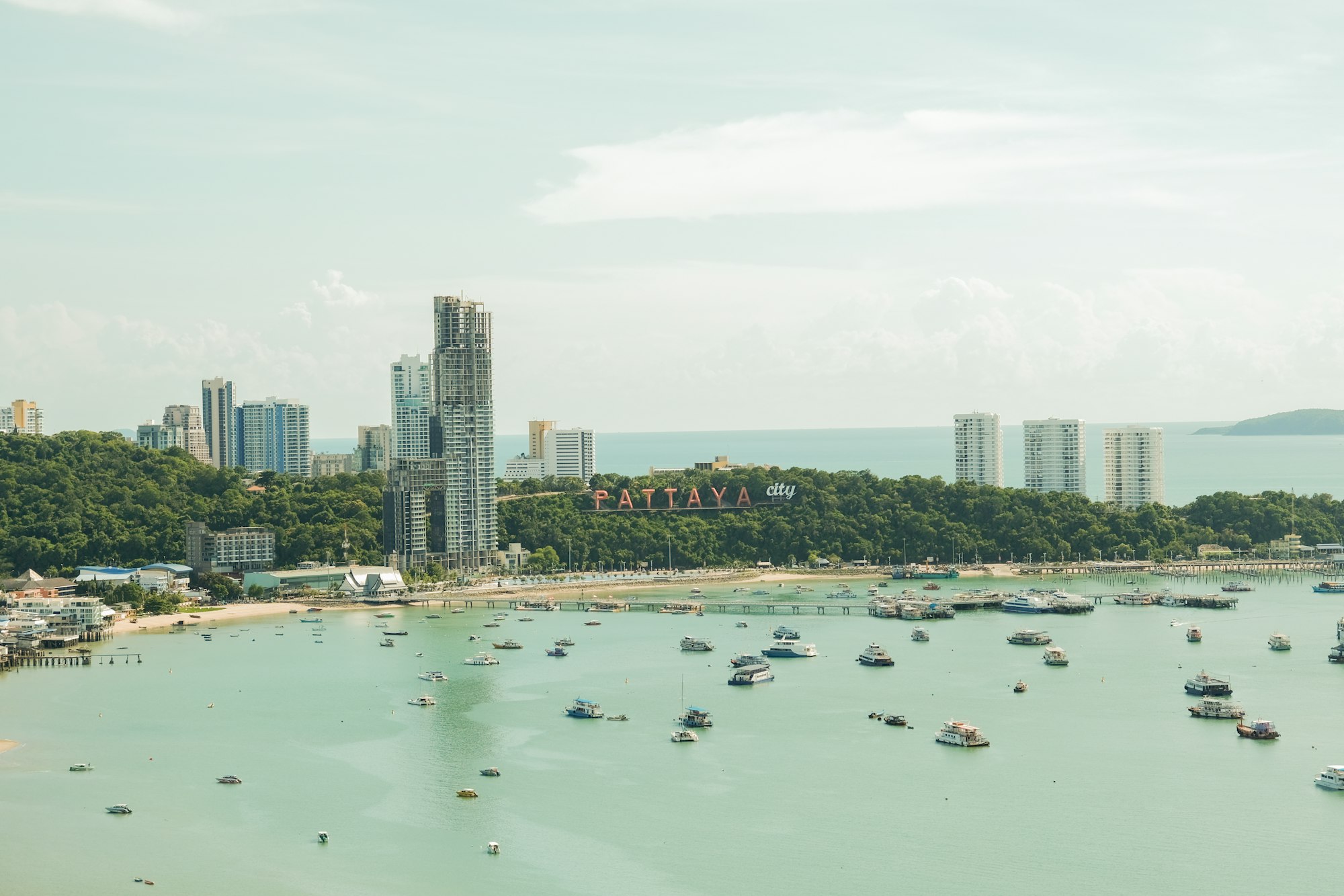 Pattaya Beach with boats in the bay